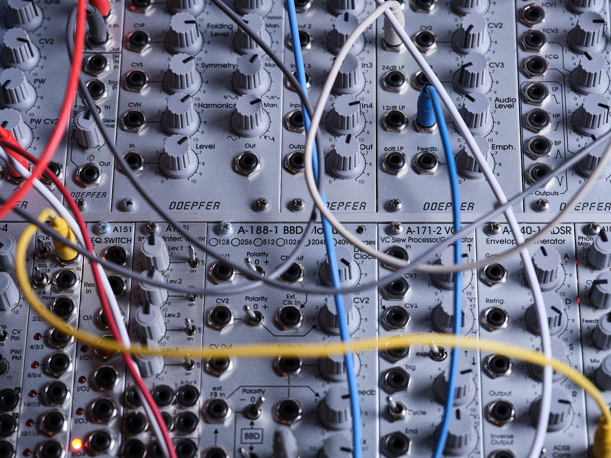 Instructor teaching modular synthesis